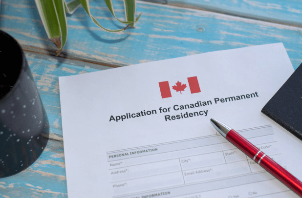 Canada is one of the most popular destinations for immigrants who want to enjoy a high quality of life, a diverse and tolerant society, and a stable and prosperous economy. Canada welcomes thousands of permanent residents every year through various immigration programs, such as Express Entry, Provincial Nominee Program, Atlantic Immigration Pilot, Rural and Northern Immigration Pilot, and more. If you are interested in becoming a permanent resident of Canada, you may be wondering how to apply for this status and what are the requirements and benefits. In this blog post, we will provide you with a comprehensive guide on how to apply for permanent residence in Canada, based on information from the official websites of the Government of Canada and other reliable sources. What is Permanent Residence in Canada? Permanent residence is a legal status that grants you the right to live, work, and study in Canada indefinitely, as long as you meet the residency obligations. You can also apply for Canadian citizenship after living in Canada for three years as a permanent resident. Permanent residents are not Canadian citizens, but they enjoy many benefits, such as: Access to public health care and social services Protection under Canadian law and the Canadian Charter of Rights and Freedoms Eligibility to apply for Canadian citizenship after meeting the criteria Ability to sponsor eligible family members to join them in Canada Permanent residents also have some responsibilities, such as: Paying taxes and respecting Canadian laws Carrying a valid permanent resident card (PR card) or permanent resident travel document (PRTD) when traveling outside Canada Not voting or running for political office Not holding certain jobs that require a high-level security clearance What are the Pathways for Permanent Residence? Canada offers various pathways for permanent residence, depending on your skills, education, work experience, language ability, family ties, and other factors. Some of the most common pathways are: Express Entry Express Entry is an online system that manages applications for three federal economic immigration programs: the Federal Skilled Worker Program, the Federal Skilled Trades Program, and the Canadian Experience Class. These programs are designed for skilled workers with at least one year of work experience in Canada or abroad and meet the language, education, and other eligibility criteria. To apply for permanent residence through Express Entry, you must create an online profile and provide information about your skills, education, work experience, language ability, and other factors. You will then receive a score based on the Comprehensive Ranking System (CRS), which ranks you against other candidates in the pool. Every two weeks, the Canadian government issues invitations to apply (ITAs) for permanent residence to the highest-ranking candidates in the pool. The minimum CRS score required to receive an ITA varies depending on the number of candidates and invitations available. If you receive an ITA, you have 60 days to submit your complete application for permanent residence online. The processing time for Express Entry applications is usually six months or less. You can check your application status online using your account. If your application is approved, you will receive a confirmation of permanent residence (COPR) and a permanent resident visa (if you need one). You must then travel to Canada and confirm your permanent resident status at a port of entry or a local immigration office. Provincial Nominee Program The Provincial Nominee Program (PNP) allows each province and territory in Canada to nominate immigrants who have the skills and experience to contribute to their economy and society. Each province and territory has its own PNP streams and criteria aligned with their specific needs and priorities. To apply for permanent residence through the PNP, you must first obtain a nomination from a province or territory. You can apply directly to a PNP stream of your choice or by creating an Express Entry profile indicating your interest in a specific province or territory. If a province or territory nominates you, you will receive additional CRS points, increasing your chances of getting an ITA from Express Entry. The processing time for PNP applications depends on the province or territory that nominated you and the federal government. You can check your application status online using your account. If your application is approved, you will receive a COPR and a permanent resident visa (if you need one). You must then travel to Canada and confirm your permanent resident status at a port of entry or a local immigration office. Atlantic Immigration Pilot The Atlantic Immigration Pilot (AIP) is a special program that helps employers in the four Atlantic provinces (New Brunswick, Nova Scotia, Prince Edward Island, and Newfoundland and Labrador) hire foreign workers and international graduates who want to live and work in the region. The AIP has three streams: the Atlantic High-Skilled Program, the Atlantic Intermediate-Skilled Program, and the Atlantic International Graduate Program. To apply for permanent residence through the AIP, you must first obtain a job offer from an employer in one of the Atlantic provinces designated to participate in the pilot. You must also meet the education, work experience, language ability, and settlement plan requirements for the stream under which you are applying. The processing time for AIP applications is usually six months or less. You can check your application status online using your account. If your application is approved, you will receive a COPR and a permanent resident visa (if you need one). You must then travel to Canada and confirm your permanent resident status at a port of entry or a local immigration office. Other Pathways There are many other pathways to apply for permanent residence in Canada, such as: The Agri-Food Pilot helps workers in the agri-food sector immigrate to Canada. The Caregiver Programs help foreign caregivers with work experience in Canada or abroad immigrate to Canada. The Economic Mobility Pathways Pilot (EMPP) helps refugees with skills and qualifications immigrate to Canada. The Home Child Care Provider and Home Support Worker Pilots help foreign workers who have work experience in Canada or abroad as home child care providers or home support workers immigrate to Canada. The Humanitarian and Compassionate Grounds, which help people who are already in Canada and have exceptional circumstances that warrant granting them permanent residence. The Permanent Residence Pathways for Hong Kong Residents help eligible Hong Kong residents with work experience or education in Canada or abroad immigrate to Canada. The Quebec Immigration Program helps people who want to live and work in Quebec immigrate to Canada. Quebec has its selection criteria and processes for immigrants, which differ from the rest of Canada. The Rural and Northern Immigration Pilot (RNIP) helps workers in various occupations immigrate to small and remote communities in Canada. The Self-Employed Persons Program helps people with relevant experience in cultural activities or athletics immigrate to Canada. The Start-Up Visa Program helps entrepreneurs with a business idea supported by a designated organization to immigrate to Canada. The Temporary Resident Permit Holder Program helps people who are inadmissible to Canada for various reasons but have a valid temporary resident permit immigrate to Canada. You can find more information about these and other pathways on the official website of Immigration, Refugees and Citizenship Canada (IRCC). How to Apply for Permanent Residence? The application process for permanent residence varies depending on the pathway you choose. However, there are some common steps that you need to follow: Check your eligibility: Before applying for permanent residence, you must ensure that you meet the eligibility criteria for your chosen pathway. You can use the online tool on the IRCC website to find out which programs you may qualify for. You can also consult the instruction guides for each program to learn more about the requirements and the documents you need. Gather your documents: Depending on the program you choose, you may need to provide various documents to support your application, such as your passport, birth certificate, education credentials, work experience certificates, language test results, police certificates, medical exam results, proof of funds, and proof of relationship. Ensure that your documents are valid, complete, and translated into English or French if they are in another language. You should also scan and save your documents in PDF format if you are applying online. Pay your fees: Depending on the program you choose, you may need to pay various fees such as the processing fee, the right of permanent residence fee (RPRF), the biometrics fee, and the third-party fees for language tests, education credential assessments (ECA), medical exams, and police certificates. You can pay your fees online using a credit or debit card. You should keep your receipt as proof of payment. Submit your application: Depending on your chosen program, you may need to submit your application online or by mail. If you are applying online, you must create an account on the IRCC website, follow the instructions to fill out the online form and upload your documents. If you are applying by mail, you must download and print the application package from the IRCC website and follow the instructions to fill out the paper form and attach your documents. You should also check the mailing address and the courier instructions for each program before sending your application. Wait for processing: After you submit your application, IRCC will review it and check if it is complete and eligible. If your application is incomplete or ineligible, it will be returned to you without processing. If your application is complete and eligible, it will be processed according to the processing times for each program. During this time, IRCC may request additional information or documents from you or ask you to attend an interview. You can check the status of your application online using your account or by calling the IRCC call center. Receive a decision: After processing your application, IRCC will send you a decision letter informing you whether your application has been approved or refused. If your application has been approved, you will receive a confirmation of permanent residence (COPR) and a visa (if applicable) or an invitation to confirm your permanent resident status online using the Permanent Residence Portal. If your application has been refused, you will receive a refusal letter explaining the reasons for refusal and informing you of your options to appeal or reapply. Conclusion Canada is a great country to live, work, and study in. It offers many opportunities and benefits for immigrants who want to become permanent residents. However, applying for permanent residence in Canada can be a complex and lengthy process that requires careful planning and preparation. If you need help with your application, you can consult an immigration consultant or a lawyer authorized to represent you. They can advise you on the best pathway for your situation, help you gather the required documents, and guide you through the application process. If you have any questions or comments, please leave them below. We would love to hear from you!